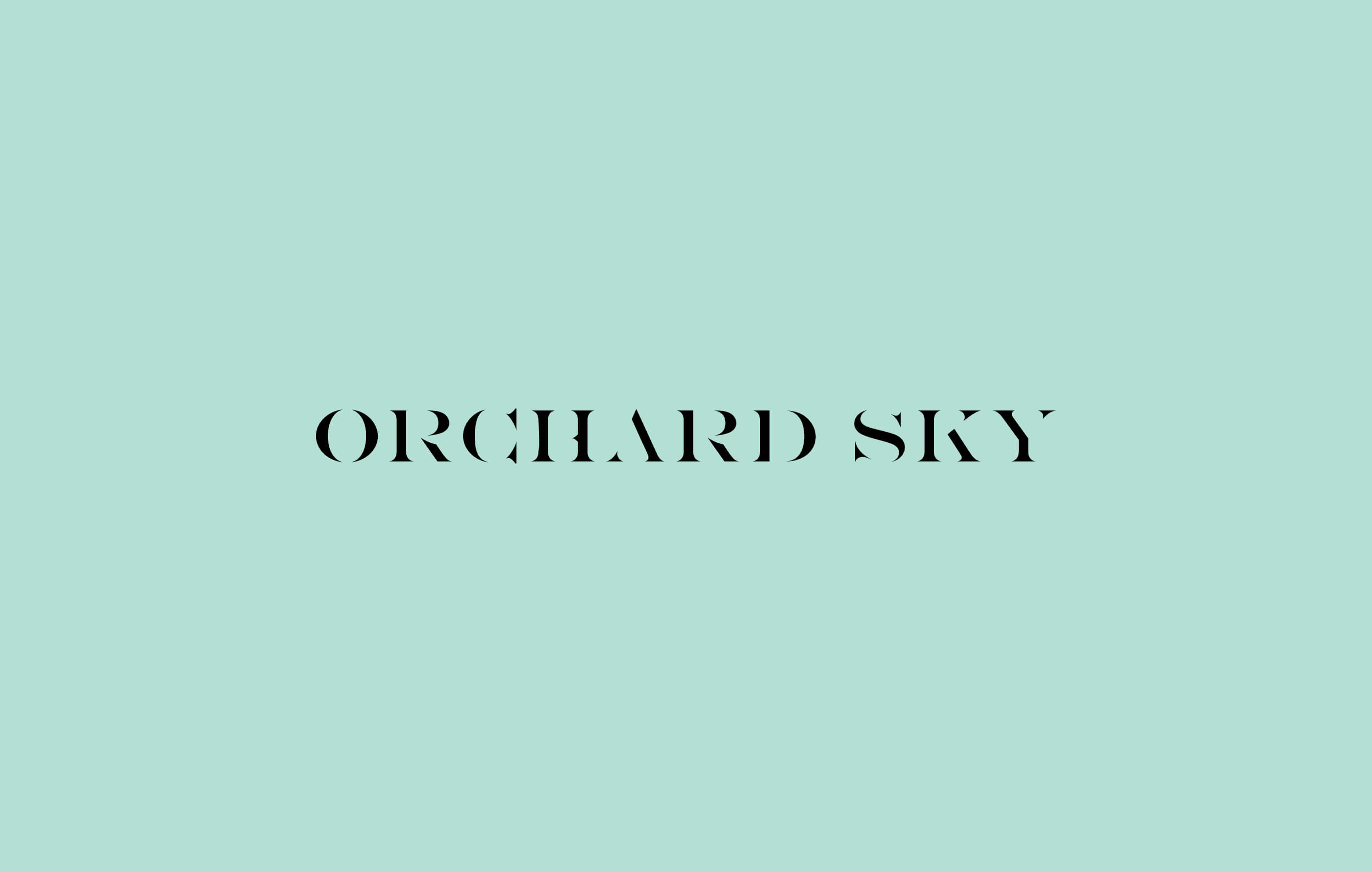 'Orchard Sky' logo in black capital letters on a mint background