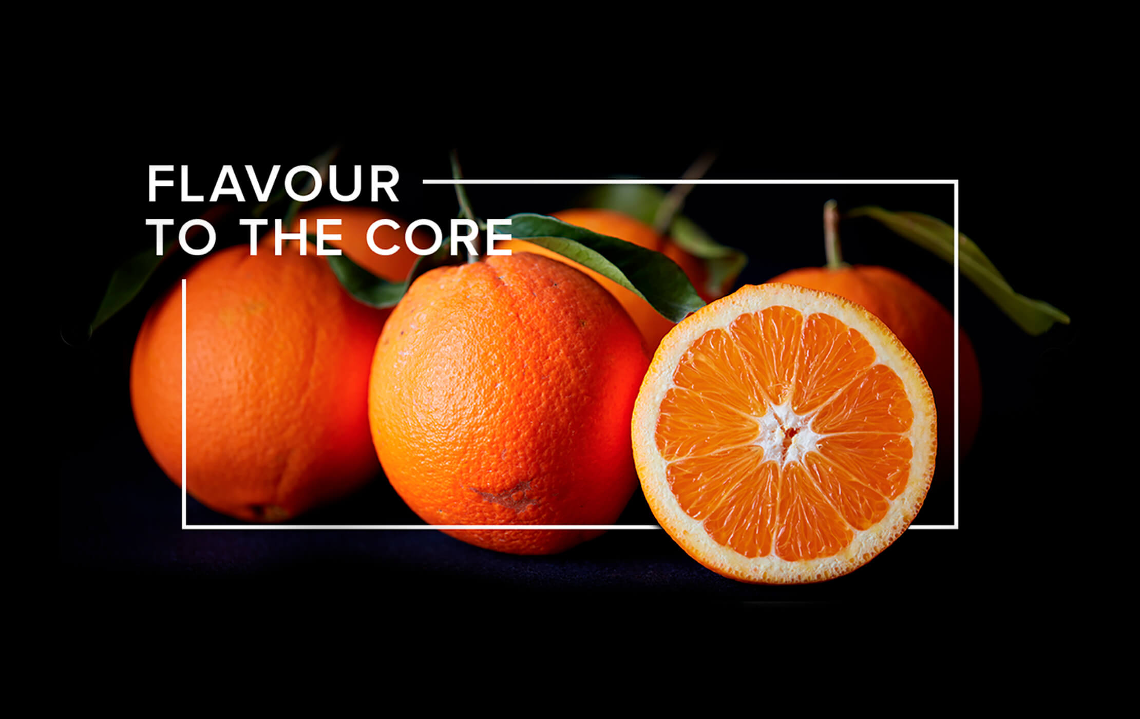 White 'Flavour to the Core' heading and rectangular frame on a black background, intertwined with oranges