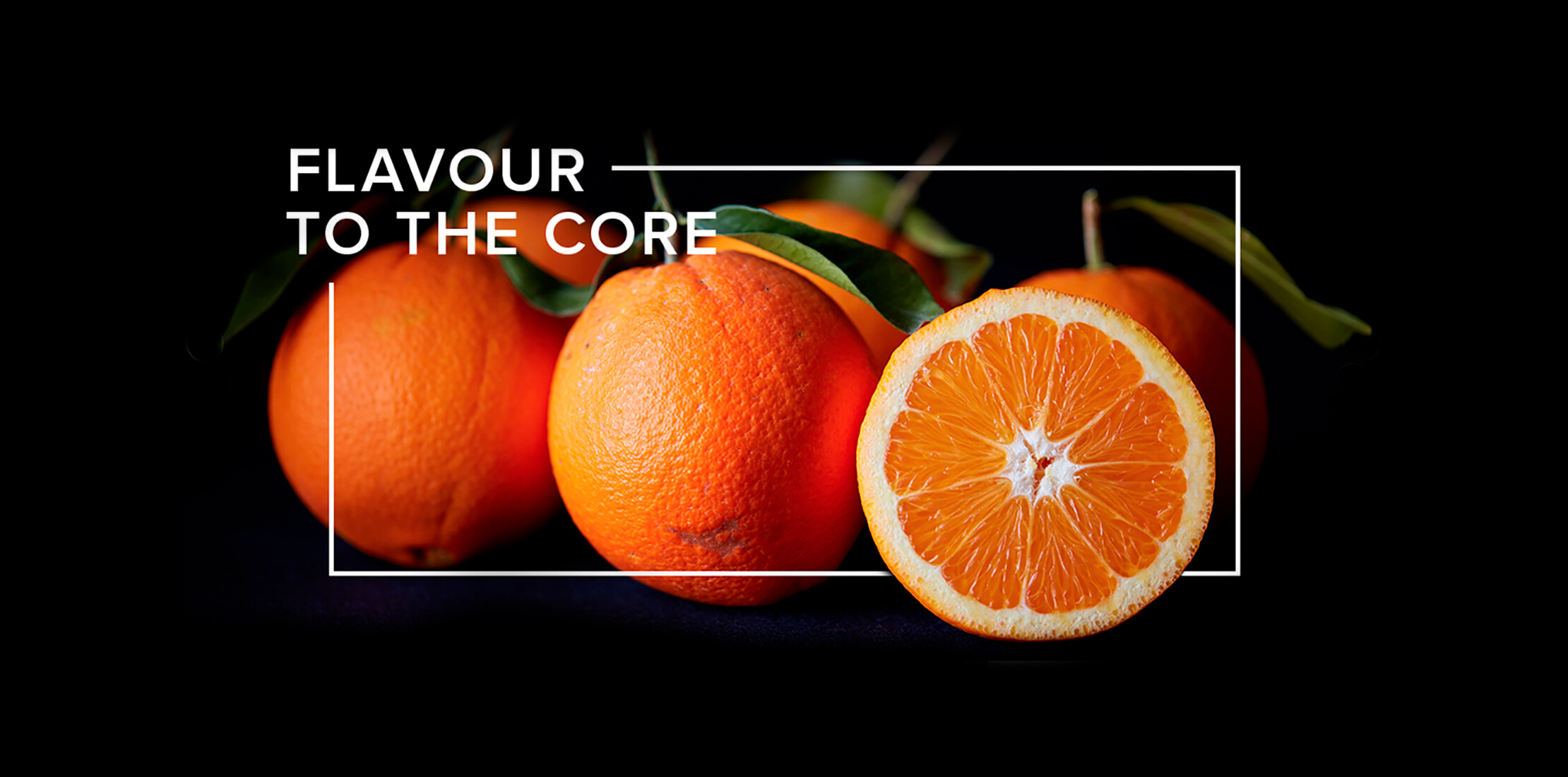 White 'Flavour to the Core' heading and rectangular frame on a black background, intertwined with oranges