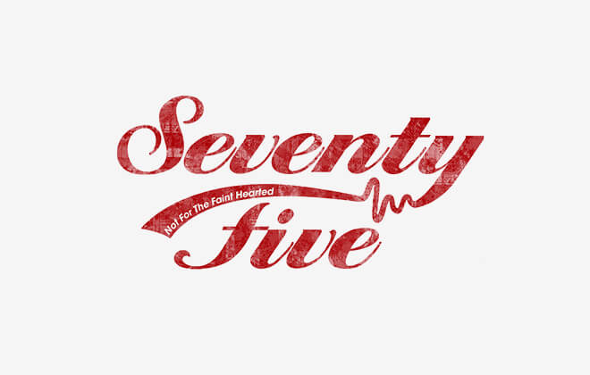 Dark red 'Seventy Five' logo on a light grey background, written in a rustic heavy script font with the tagline 'Not for the Faint Hearted' in white